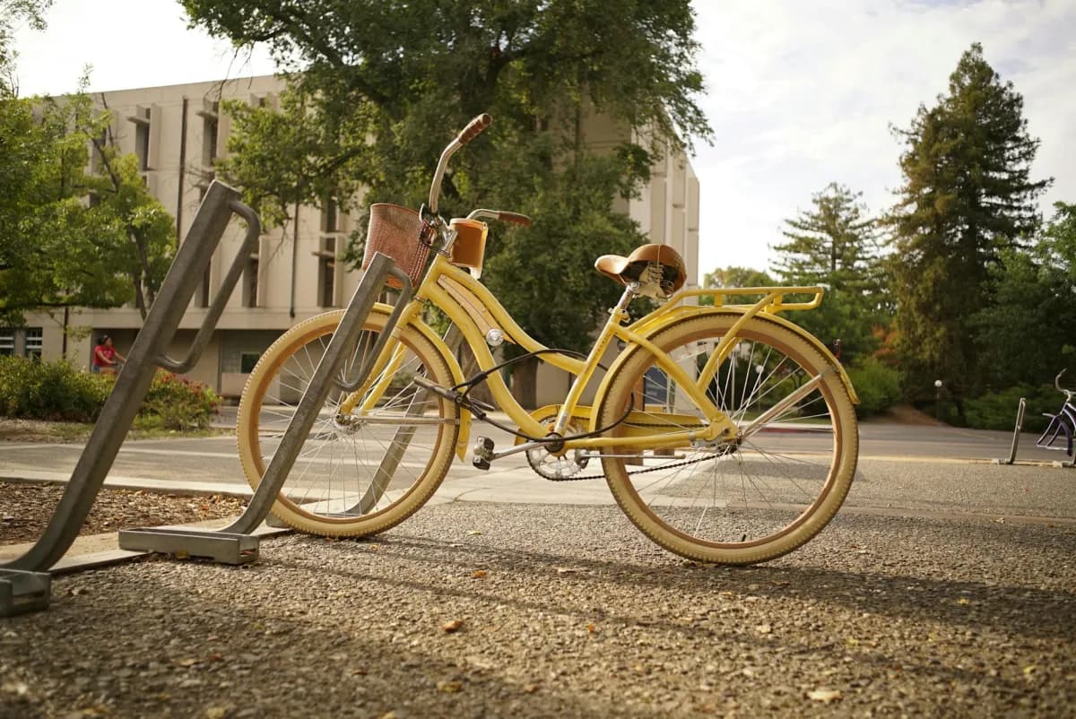 Bicycle locked to a campus bike rack at a university or college in Canada